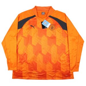 re_1692033784_man-city-2023-2024-pre-match-ls-football-sweat-top-orange_d4c2f6b7-cac5-4221-91fd-9e43b6d3cc17