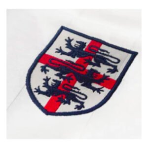 re_1698704165_england-2023-2024-tribute-sir-bobby-football-shirt-back