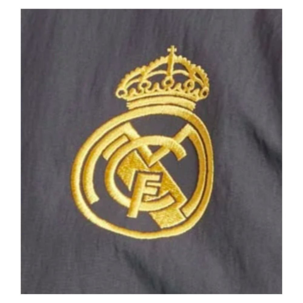 re_1700795087_real-madrid-2023-2024-eu-football-presentation-jacket-carbon-cu