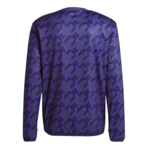 re_1703715209_real-madrid-2023-2024-football-pre-match-warm-top-shadow-navy-back