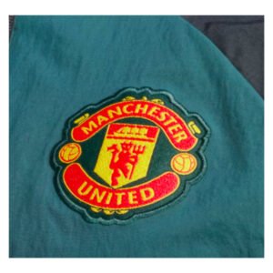 re_1713141296_man-utd-2023-2024-football-tracksuit-top-back-2