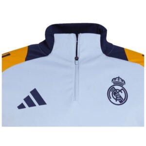 re_1718591168_real-madrid-2024-2025-football-training-top-glow-blue-badge-3
