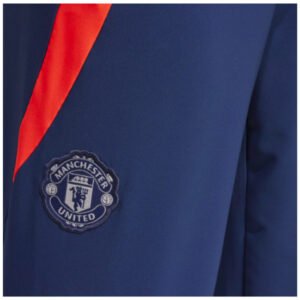 re_1719283089_man-utd-2024-2025-football-presentation-pants-night-indigo-badge-2